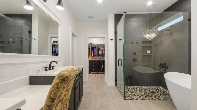 Bathroom, Chandelier, Dual Sink Vanities, Free Standing Baths, Glass Shower, Interior, Recessed Lighting, Walk-in Closets, Wood Texture Flooring