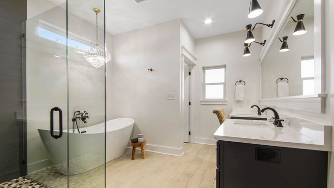 Bathroom, Dual Sink Vanities, Free Standing Baths, Glass Shower, Interior, Pendant Lights, Recessed Lighting, Wood Texture Flooring