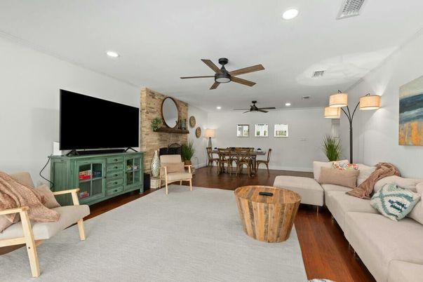 Dining room, Interior, Living room, Recessed Lighting, Stone Walls, Wood Texture Flooring