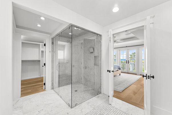 Bathroom, Glass Shower, Interior, Marble, Marble Walls, Recessed Lighting, Wood Texture Flooring