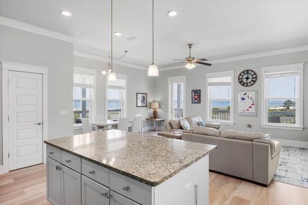 Dining room, Interior, Living room, Pendant Lights, Recessed Lighting, Water, Wood Texture Flooring