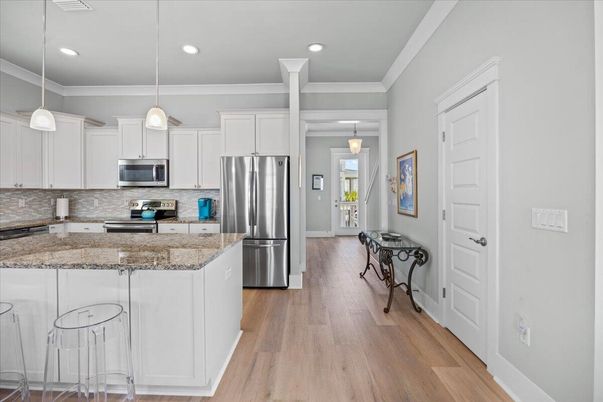 Interior, Kitchen, Pendant Lights, Recessed Lighting, Stainless Steel Appliances, Wood Texture Flooring
