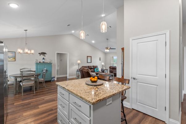 Chandelier, Dining room, Interior, Living room, Pendant Lights, Recessed Lighting, Wood Texture Flooring