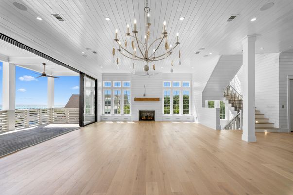 Chandelier, Empty room, Fireplace, Interior, Recessed Lighting, Wood Texture Flooring
