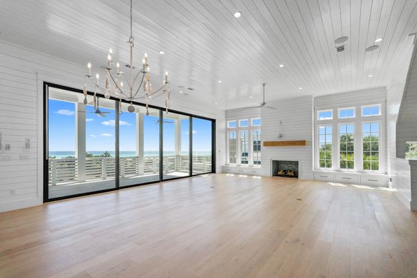 Chandelier, Empty room, Fireplace, Interior, Pendant Lights, Recessed Lighting, Wood Texture Flooring