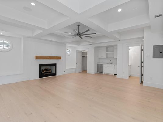 Empty room, Fireplace, Interior, Kitchen, Recessed Lighting, Wood Texture Flooring