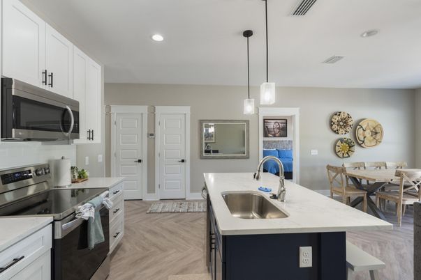Dining room, Interior, Kitchen, Pendant Lights, Recessed Lighting, Stainless Steel Appliances, Wood Texture Flooring