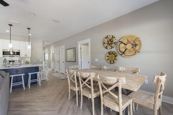 Dining room, Interior, Kitchen, Pendant Lights, Recessed Lighting, Stainless Steel Appliances, Wood Texture Flooring