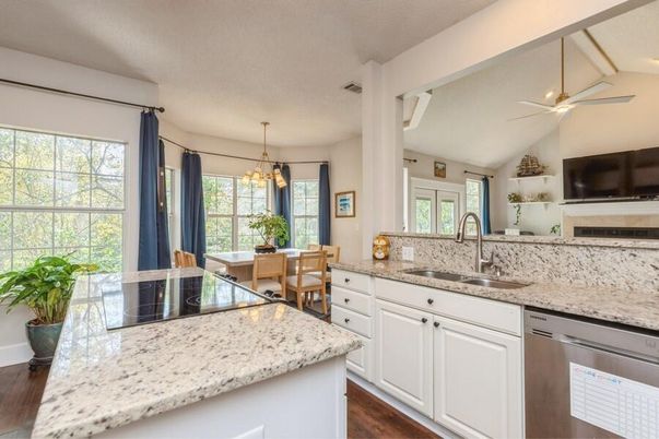 Dining room, Interior, Kitchen, Pendant Lights, Stainless Steel Appliances, Wood Texture Flooring