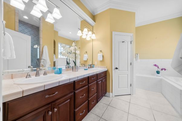 Bathroom, Dual Sink Vanities, Interior, Recessed Lighting, Tile Countertops