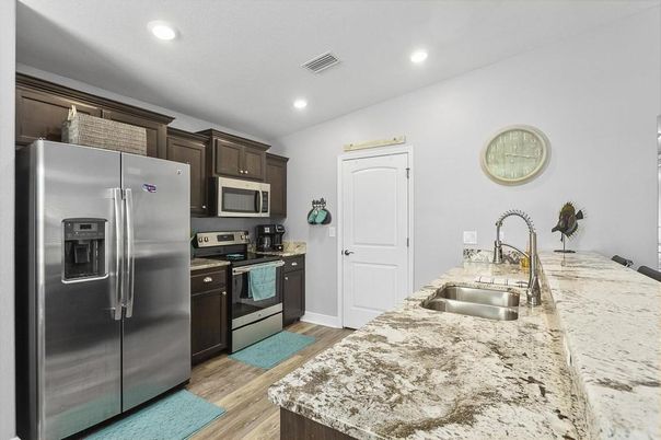 Interior, Kitchen, Recessed Lighting, Stainless Steel Appliances, Wood Texture Flooring