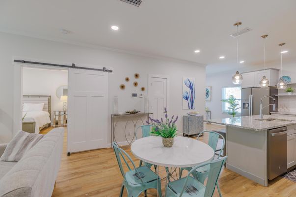 Dining room, Interior, Kitchen, Pendant Lights, Recessed Lighting, Stainless Steel Appliances, Wood Texture Flooring