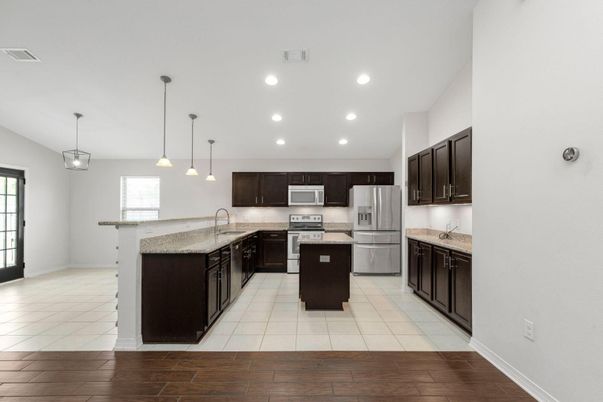 Interior, Kitchen, Pendant Lights, Recessed Lighting, Stainless Steel Appliances, Wood Texture Flooring