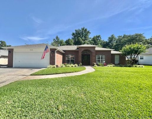Attached, Backyard, Exterior, Facade, Brick Facade, Ranch