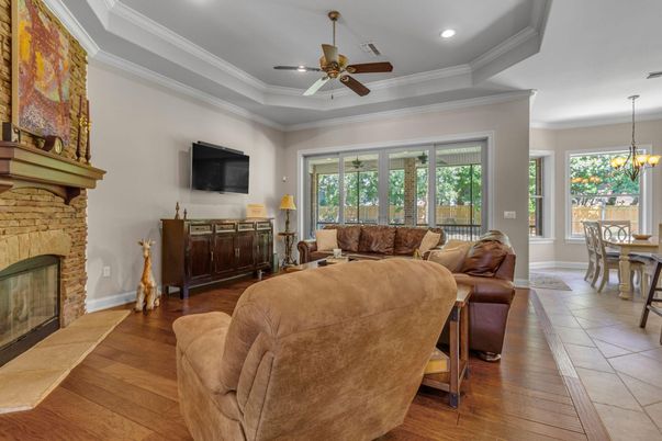 Chandelier, Dining room, Fireplace, Interior, Living room, Recessed Lighting, Wood Texture Flooring