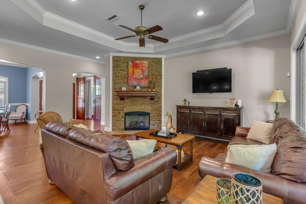 Fireplace, Interior, Living room, Recessed Lighting, Stone Walls, Wood Texture Flooring