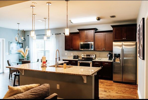 Dining room, Interior, Kitchen, Pendant Lights, Stainless Steel Appliances, Wood Texture Flooring