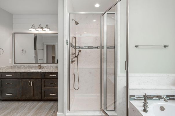 Bathroom, Dual Sink Vanities, Glass Shower, Interior, Recessed Lighting, Wood Texture Flooring