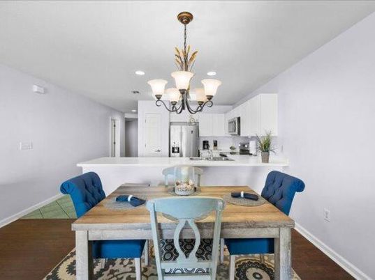 Chandelier, Dining room, Interior, Kitchen, Recessed Lighting, Stainless Steel Appliances, Wood Texture Flooring