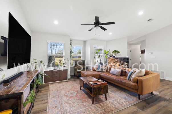 Fireplace, Interior, Living room, Recessed Lighting, Wood Texture Flooring