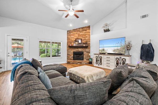 Fireplace, Interior, Living room, Recessed Lighting, Stone Walls, Wood Texture Flooring