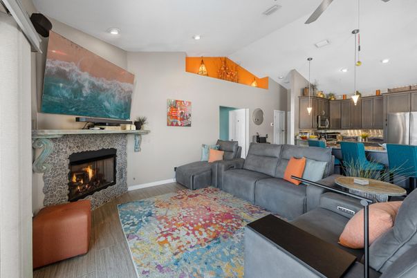 Fireplace, Interior, Kitchen, Living room, Pendant Lights, Recessed Lighting, Stainless Steel Appliances, Wood Texture Flooring