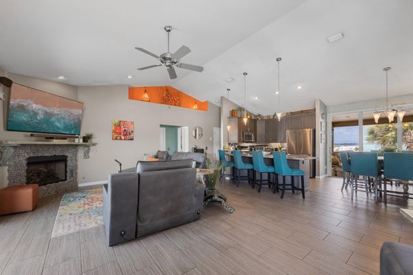 Dining room, Fireplace, Interior, Kitchen, Living room, Pendant Lights, Recessed Lighting, Stainless Steel Appliances, Wood Texture Flooring