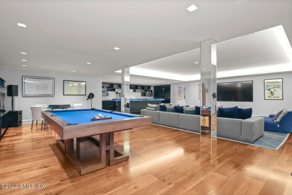 Billiard Table, Game Room, Interior, Living room, Pendant Lights, Recessed Lighting, Wood Texture Flooring