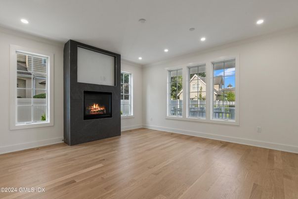 Empty room, Fireplace, Interior, Recessed Lighting, Wood Texture Flooring