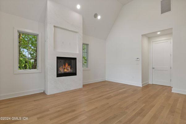 Empty room, Fireplace, Interior, Recessed Lighting, Wood Texture Flooring