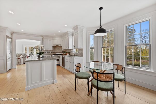 Dining room, Interior, Kitchen, Pendant Lights, Recessed Lighting, Stainless Steel Appliances, Wood Texture Flooring