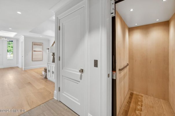 Elevator, Interior, Recessed Lighting, Wood Texture Flooring, Wooden Walls