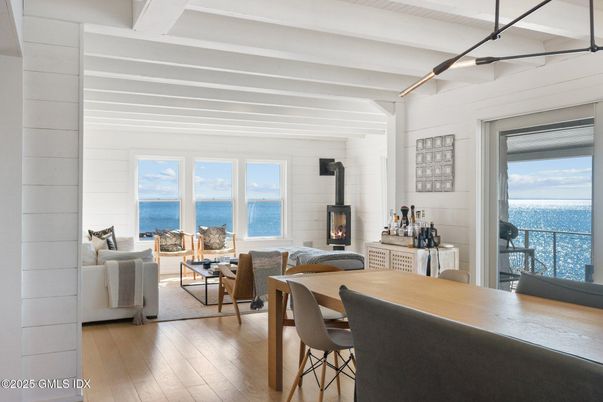 Dining room, Fireplace, Interior, Living room, Water, Wood Texture Flooring