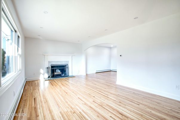 Empty room, Fireplace, Interior, Recessed Lighting, Wood Texture Flooring