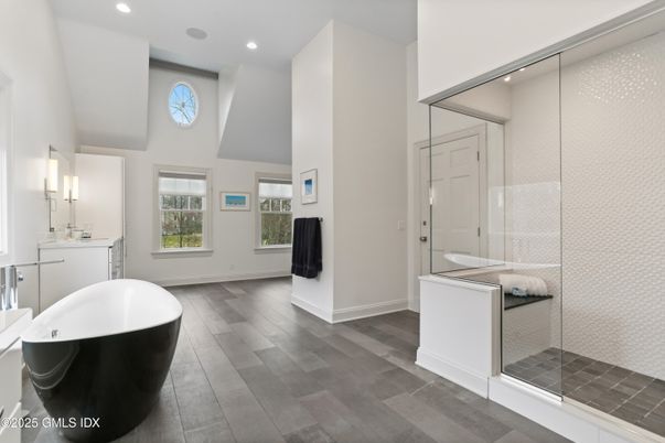 Bathroom, Free Standing Baths, Glass Shower, Interior, Recessed Lighting, Wood Texture Flooring