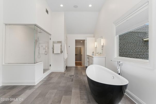Bathroom, Free Standing Baths, Glass Shower, Interior, Recessed Lighting, Wood Texture Flooring