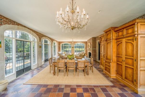 Chandelier, Dining room, Fireplace, Interior, Stone Walls