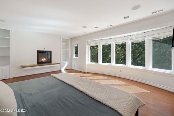 Bedroom, Fireplace, Interior, Recessed Lighting, Wood Texture Flooring