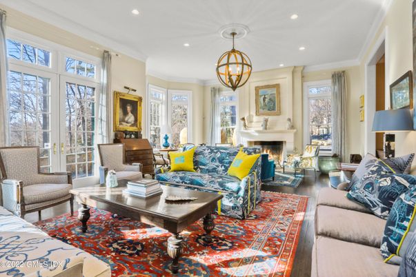 Chandelier, Fireplace, Interior, Living room, Pendant Lights, Recessed Lighting, Wood Texture Flooring