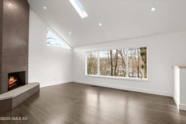 Empty room, Fireplace, Interior, Recessed Lighting, Wood Texture Flooring