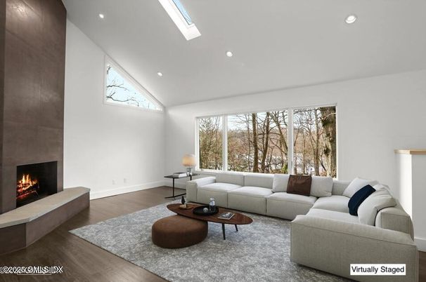 Fireplace, Interior, Living room, Recessed Lighting, Wood Texture Flooring