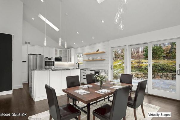 Dining room, Interior, Kitchen, Pendant Lights, Recessed Lighting, Stainless Steel Appliances, Wood Texture Flooring