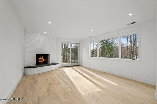 Empty room, Fireplace, Interior, Recessed Lighting, Wood Texture Flooring
