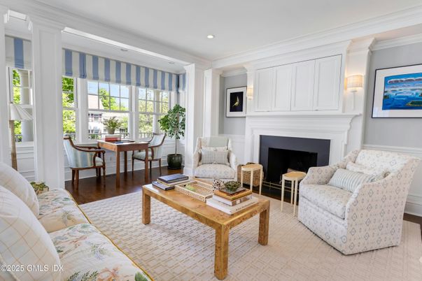 Dining room, Fireplace, Interior, Living room, Recessed Lighting, Wood Texture Flooring