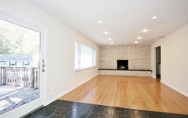 Fireplace, Interior, Recessed Lighting, Stone Walls, Wood Texture Flooring