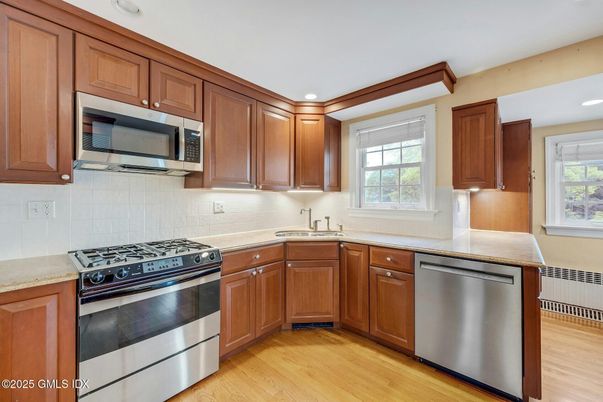 Interior, Kitchen, Recessed Lighting, Stainless Steel Appliances, Wood Texture Flooring