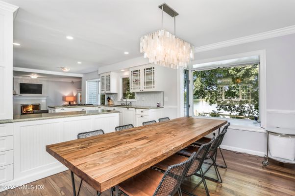 Chandelier, Dining room, Fireplace, Interior, Recessed Lighting, Wood Texture Flooring