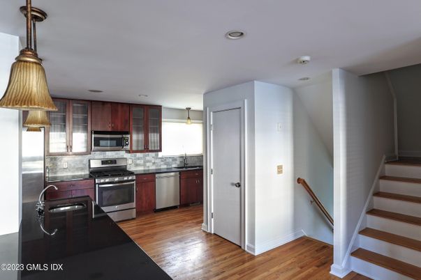 Interior, Kitchen, Pendant Lights, Recessed Lighting, Stainless Steel Appliances, Wood Texture Flooring