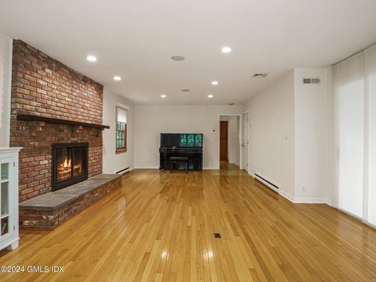Fireplace, Interior, Piano, Recessed Lighting, Stone Walls, Wood Texture Flooring