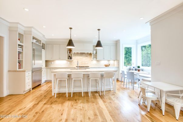 Dining room, Interior, Kitchen, Pendant Lights, Recessed Lighting, Stainless Steel Appliances, Wood Texture Flooring
